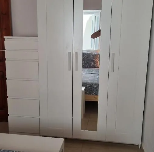 Kozas Art House, * Sými